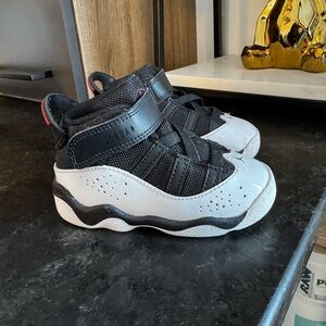 Jordan Kids Black and White High-Top Sneakers
